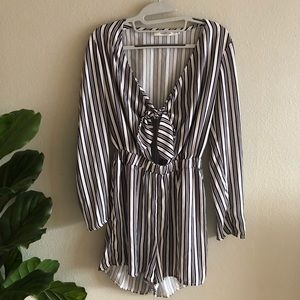 Striped long sleeve romper with front tie. Size S